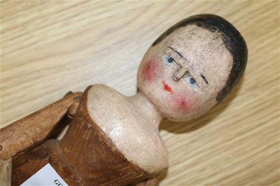 A 19th century folk art peg doll 36cm.
